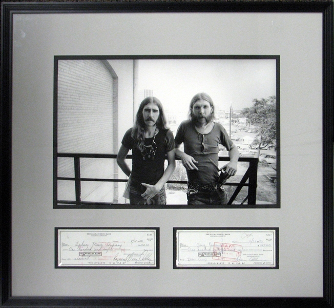 The Allman Brothers Band Duane Allman and Berry Oakley Signed and Cancelled Bank Checks (2) in Framed Display
